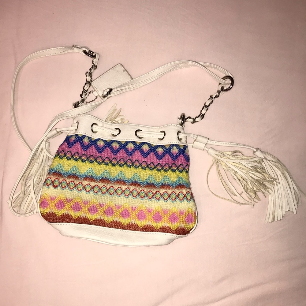 Carlos Santana white-colored cross-body purse